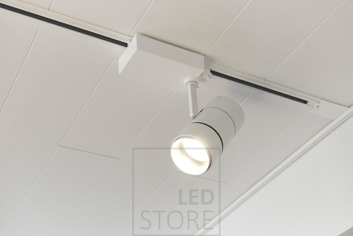 White rail luminaire in a recessed three-phase rail, with adjustable light opening angle and selectable light colour temperature from the switch. Ledstore.fi
